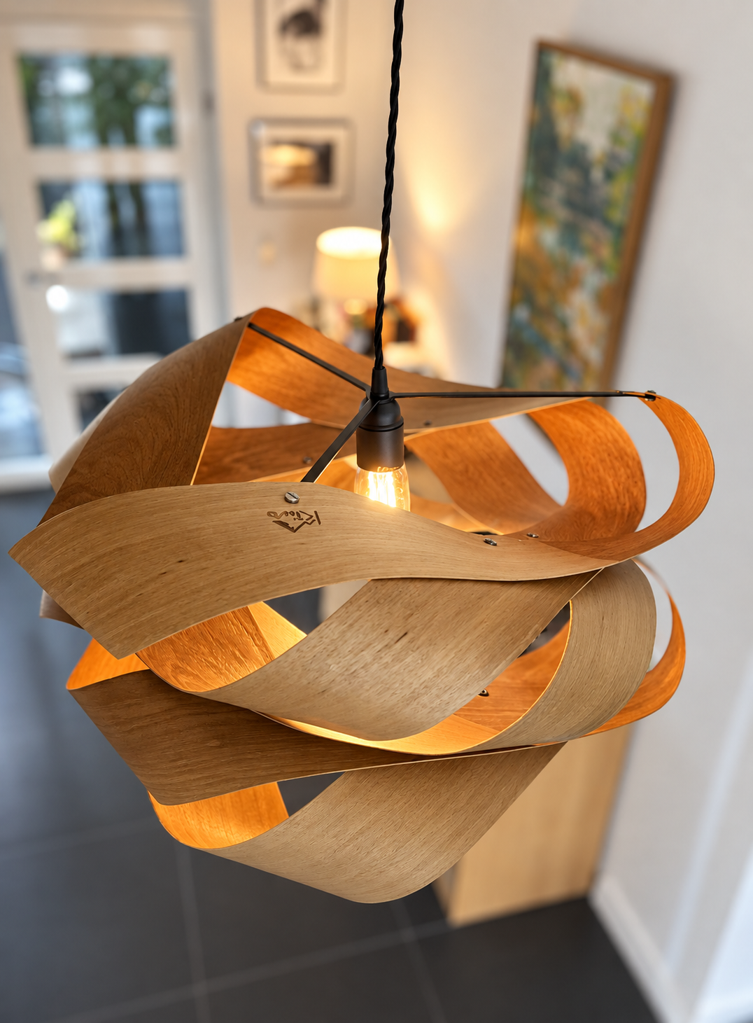 The Swell curved wooden ribbons and suspension detail
